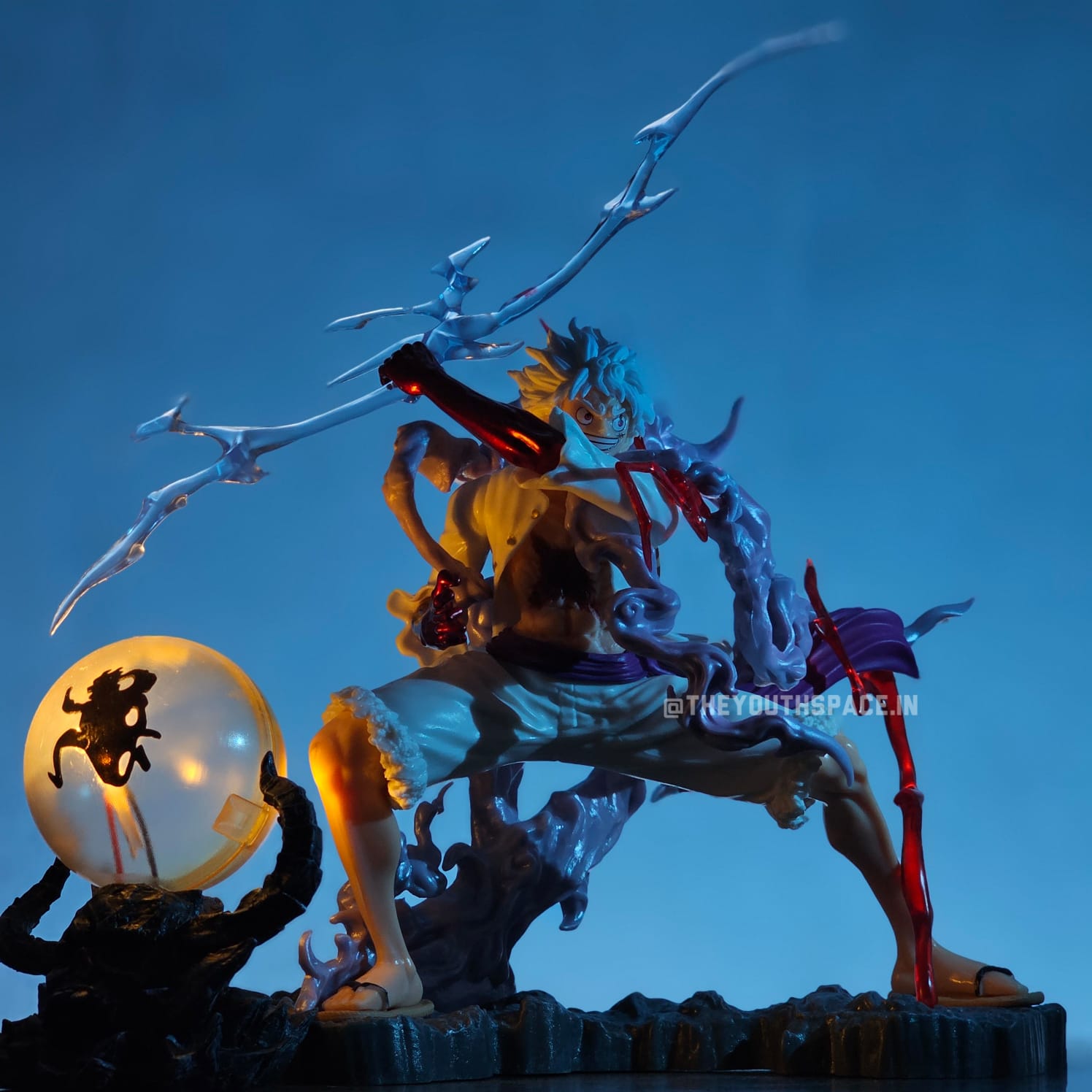 The drums of liberation: Luffy Son God Nika Action Figure (with light) - One Piece