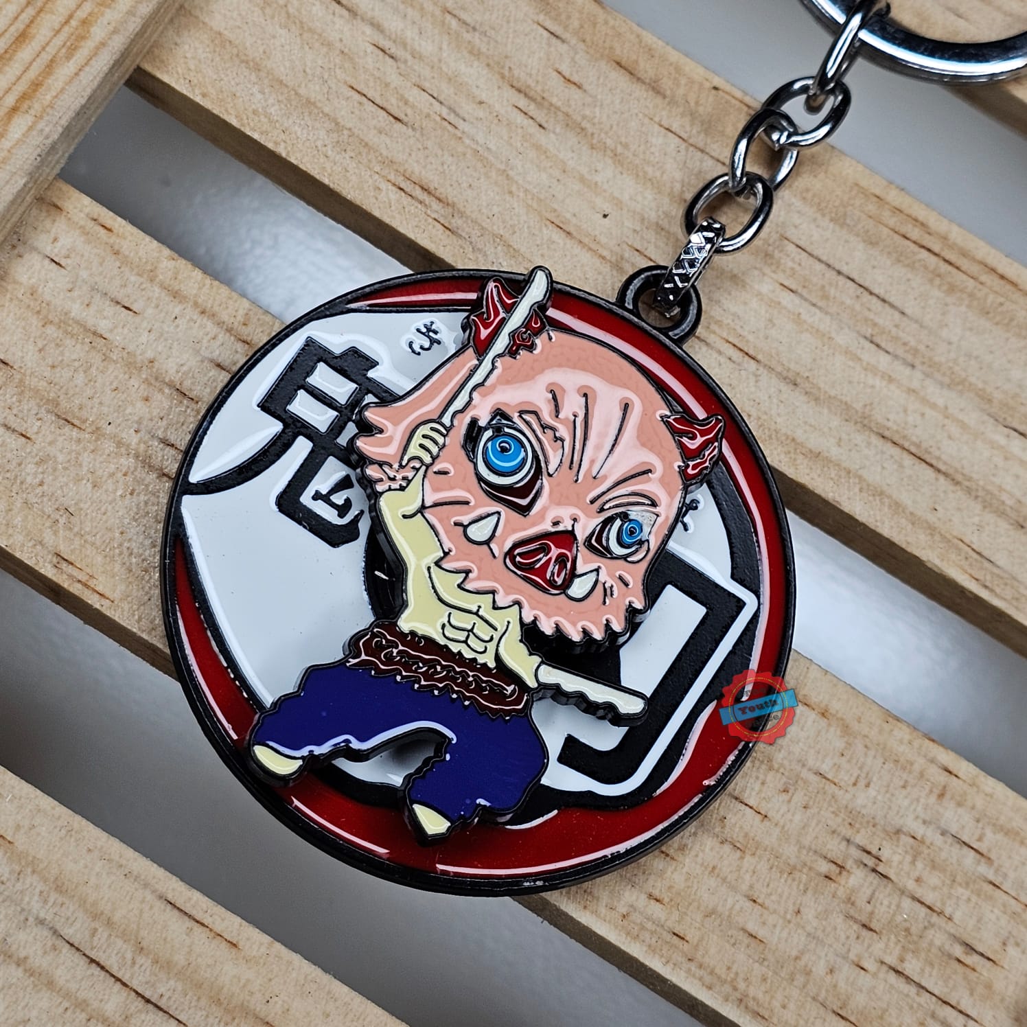 Inosuke rotating sharingan keychain